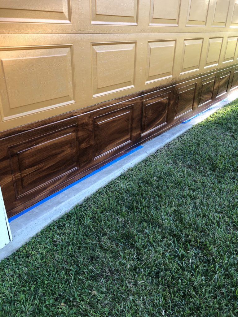 One row done for the faux wood garage door painting project